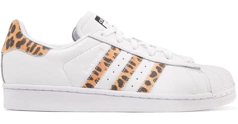 Adidas sneakers with leopard trim